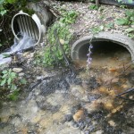 car and outlet 002 flowing culverts